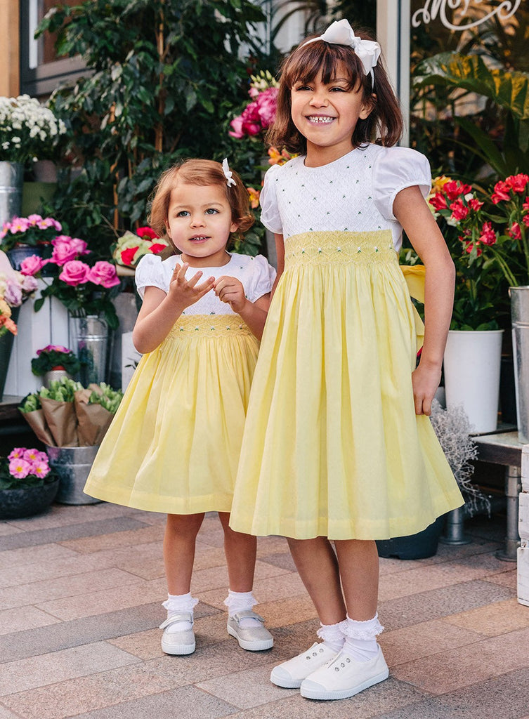 Girls Rose Hand Smocked Dress in Lemon Yellow