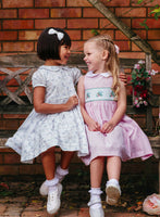 Girls Tweetie Bird Smocked Dress in Pink Stripe | Trotters London